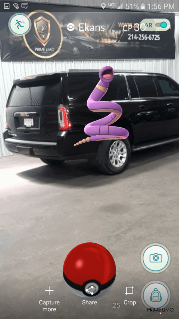 Black Yukon XL with Prime Limo banner and jumping Pokemon Ekans